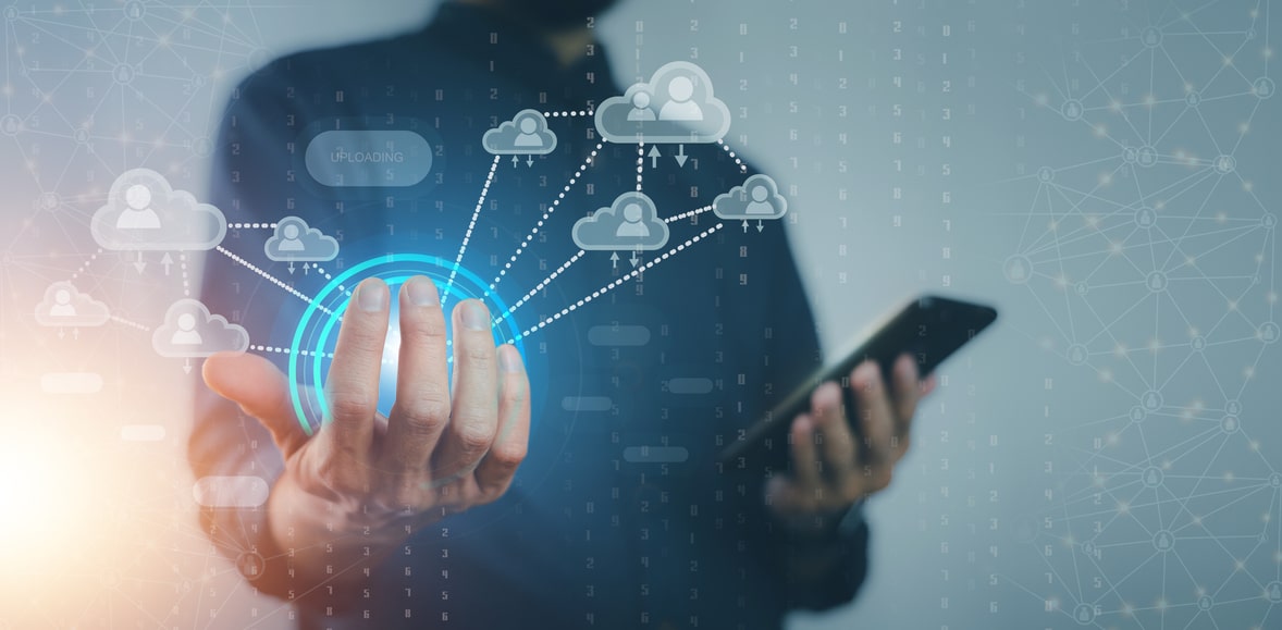Illustration of man holding cloud tech