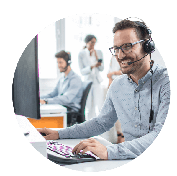 Man using headset on computer