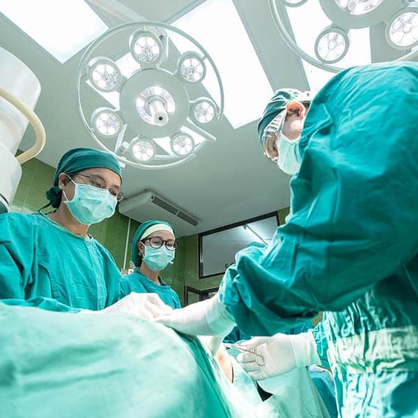 Surgeons performing surgery